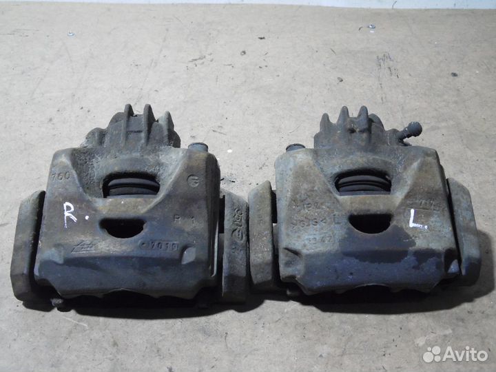 Суппорта передние Ситроен С4 Б7