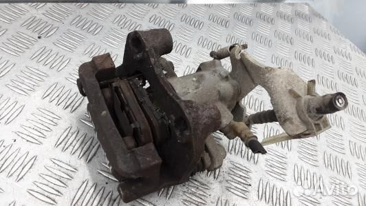 Суппорт тормозной задний левый toyota urban cruise