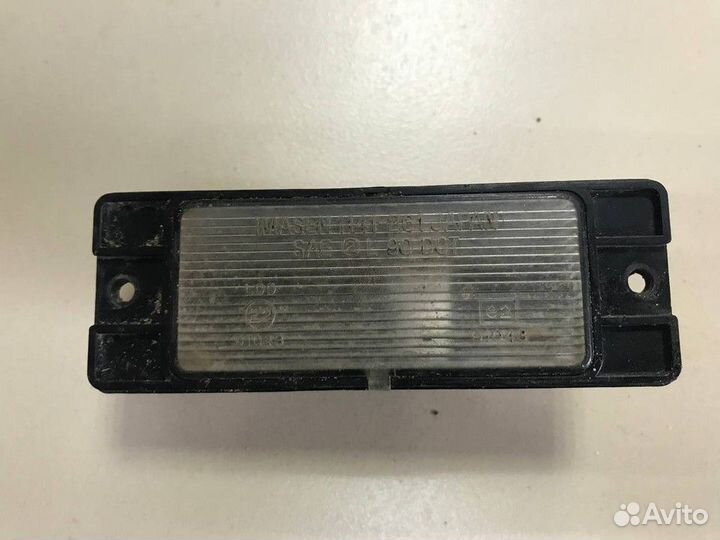 Фонарь подсветки номера Mitsubishi Pajero