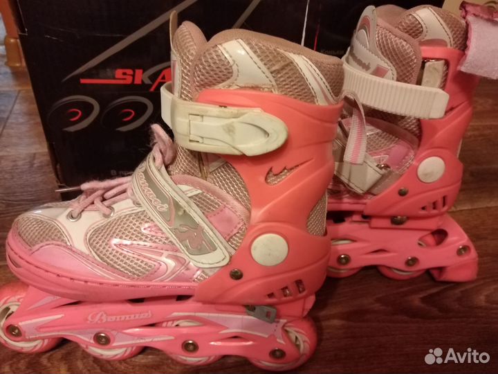 Роликовые коньки