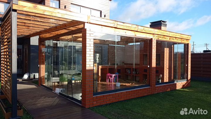 Безрамное раздвижное остекление