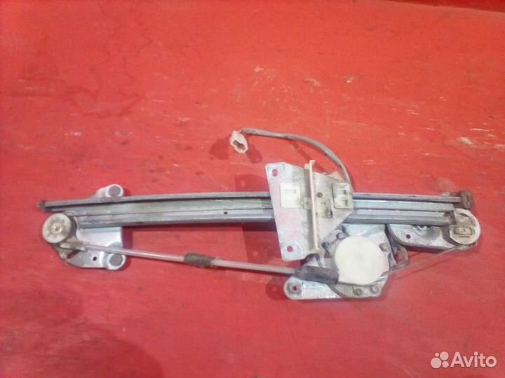Стеклоподъемник задний левый Мазда 626