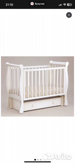 Детская кроватка с маятником лель