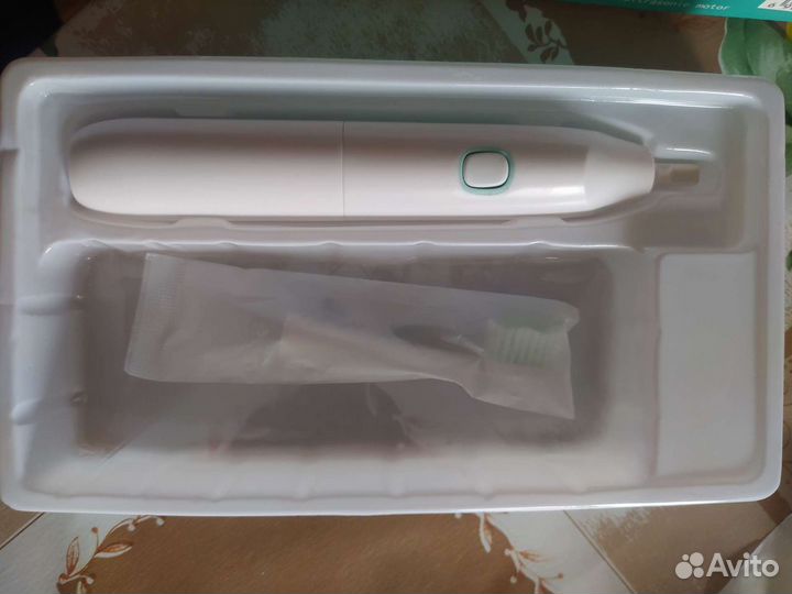 Электрическая зубная щётка