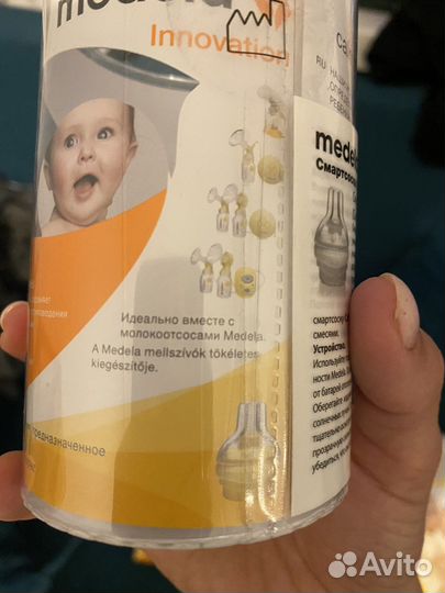Молокоотсос и бутылочки medela