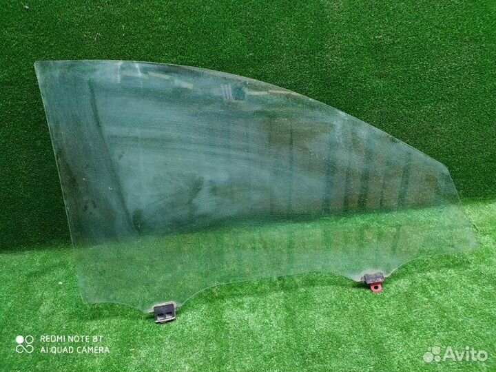 Стекло двери переднее левое Toyota Corolla 120