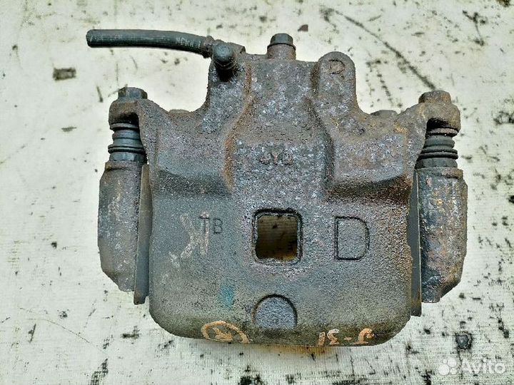 Суппорт тормозной передний правый Nissan Teana J31 J31