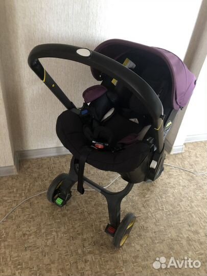 Автолюлька на колесах doona