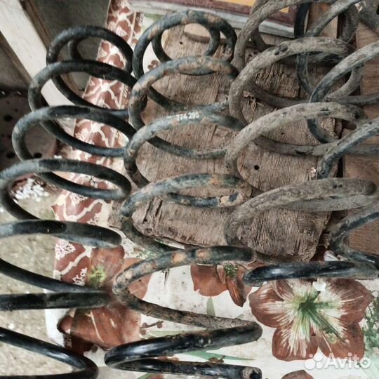 Пружина передней подвески Opel Astra H