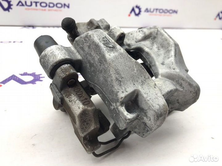 Суппорт тормозной задний левый Mercedes C-Class