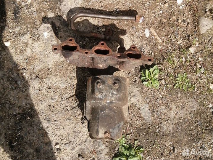 Коллектор выпускной carnival / sedona 1998 -2005