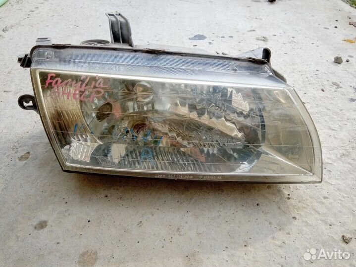 Фара передняя Mazda Familia