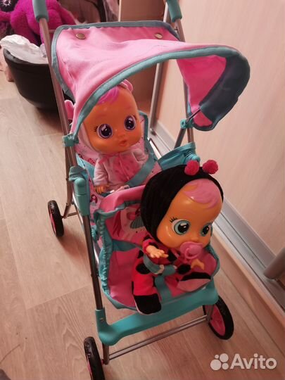Коляска кукольная с пупсами