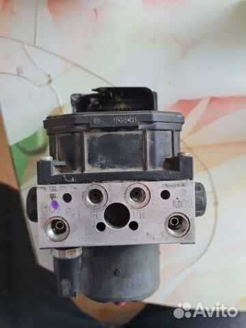 Блок abs subaru 27596ag000 насос