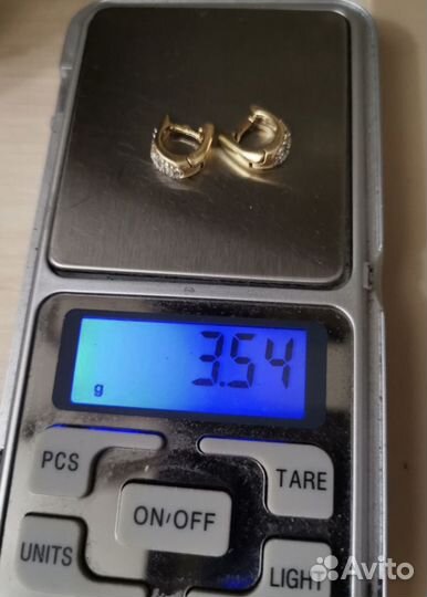 Золотые серьги 750
