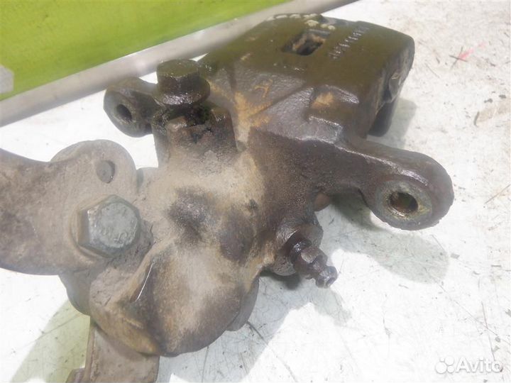 Суппорт задний правый Хендай Лантра 96-00