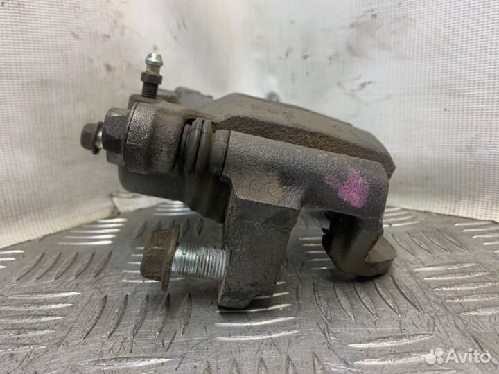 Суппорт тормозной задний левый Nissan X-Trail T31