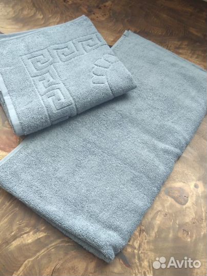 Полотенца для отелей цветные махровые