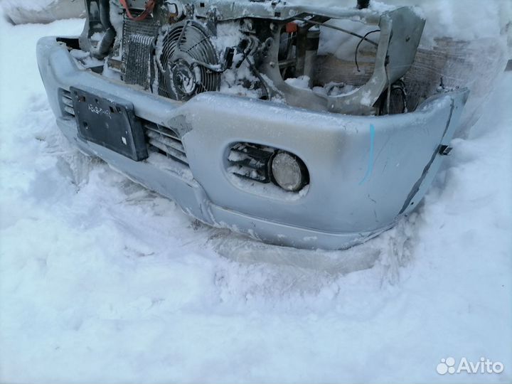 Бампер передний Mitsubishi Pajero Sport K90