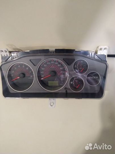 Щиток приборов мицубиси лансер 9 до рест. 2005г