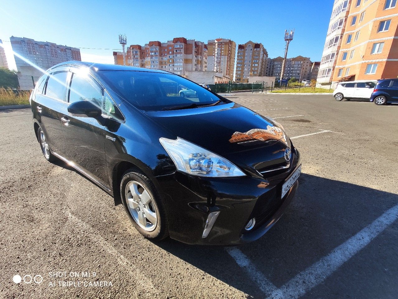 Toyota Prius Alpha: фото владельца