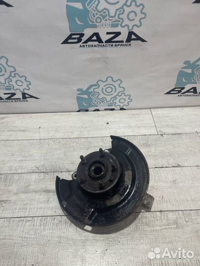 Кулак передний левый Chevrolet Cruze