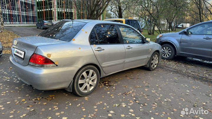 Mitsubishi Lancer 1.6 AT, 2009, 260 000 км