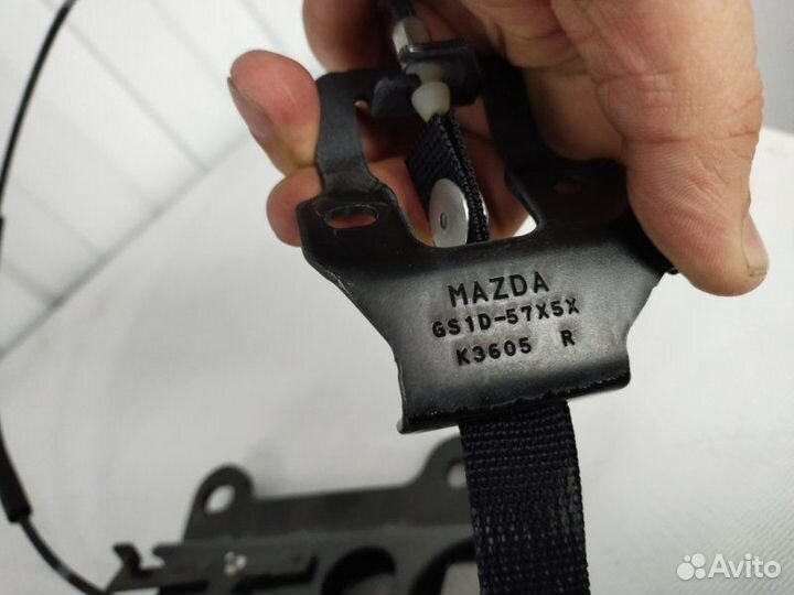 Трос регулировки сидения задний правый Mazda