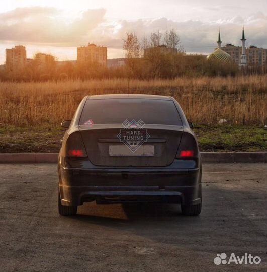 Накладка на задний бампер Ford Focus 2 Дорестайл