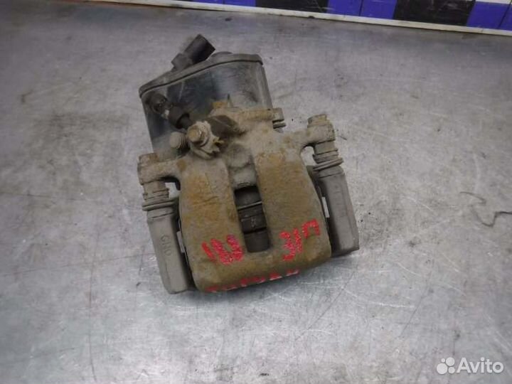 Суппорт задний правый Volkswagen Tiguan cava 2009