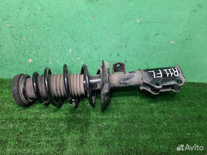 Стойка амортизатора передняя левая Opel Zafira C