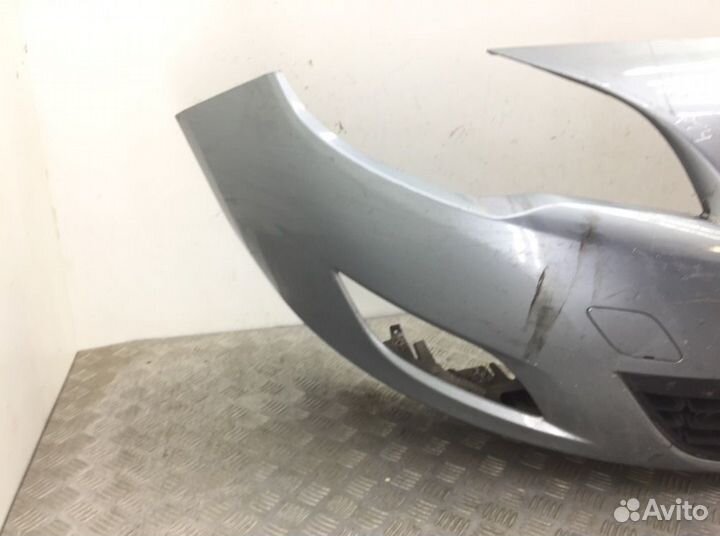 Бампер 13264403 Opel Astra J (2010-2017)