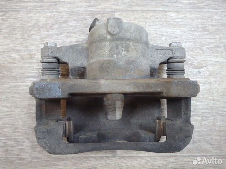 Суппорт тормозной передний левый Albea Альбеа