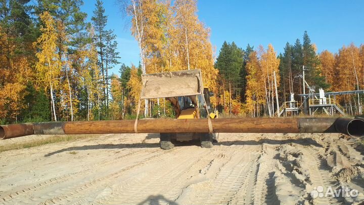 Эксковатор - погрузчик