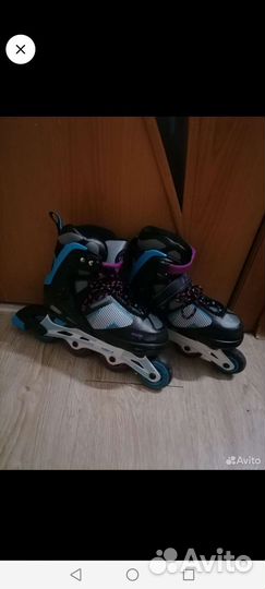 Роликовые коньки