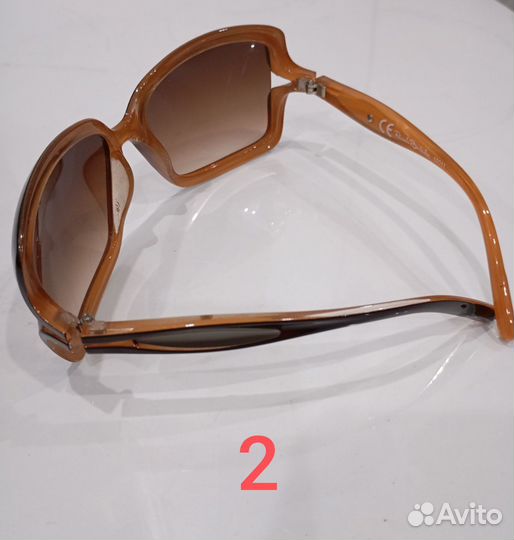 Солнцезащитные очки брендовые