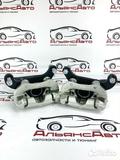 Суппорта ваз на ниву комплект - в сборе