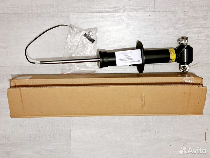 Амортизатор Cadillac