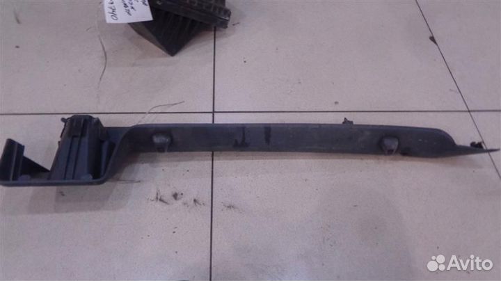 Кронштейн полки багажника левый Nissan Primera P1