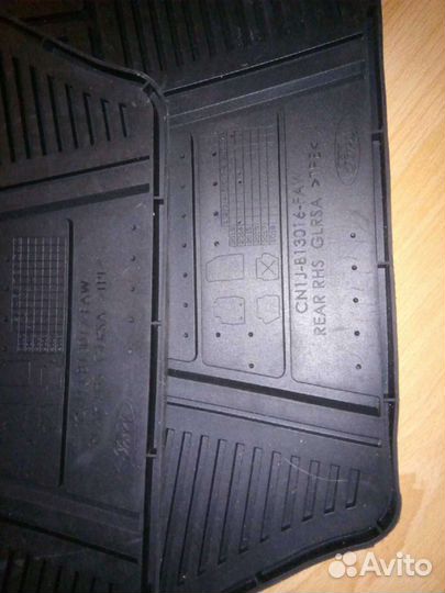 Резиновые новые коврики ford