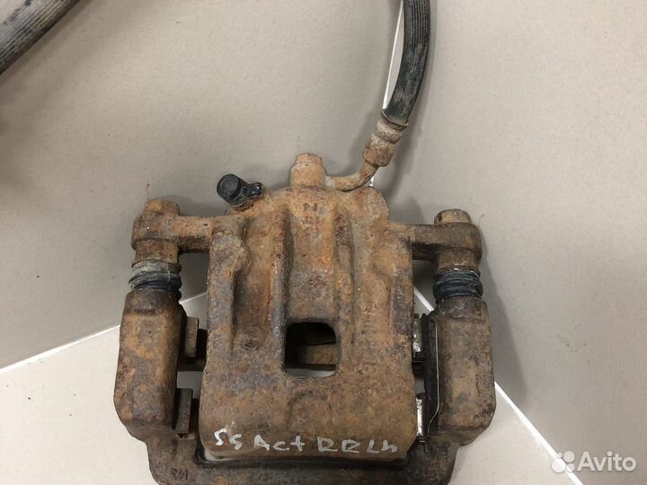 Суппорт тормозной задний LH SsangYong Actyon NEW