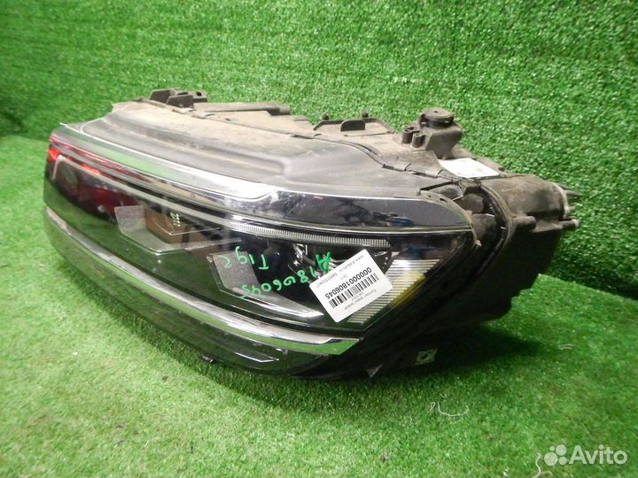 Фара левая Volkswagen Tiguan