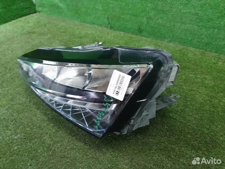 Фара левая Skoda Rapid