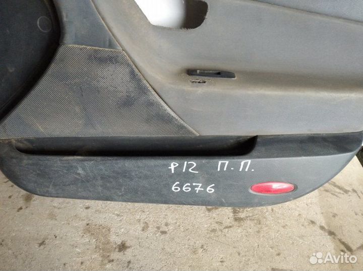 Обшивка двери передняя правая Nissan Primera P12