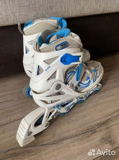 Роликовые коньки