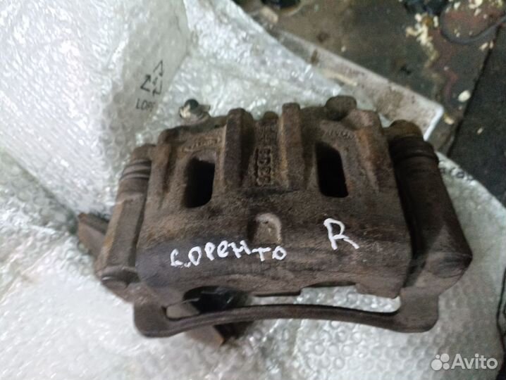 Передний правый суппорт Kia Sorento 1