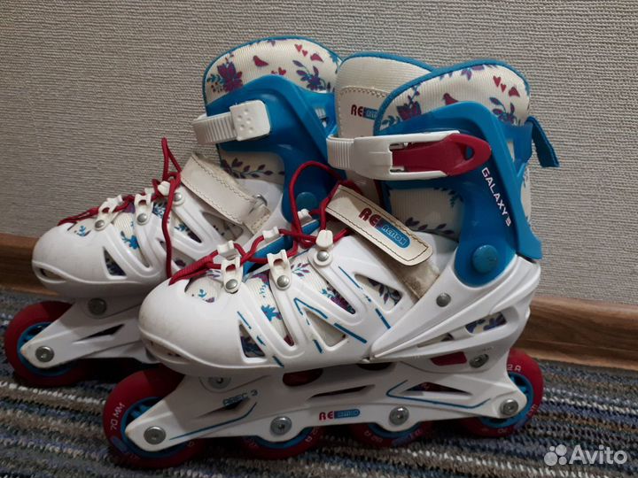 Роликовые коньки