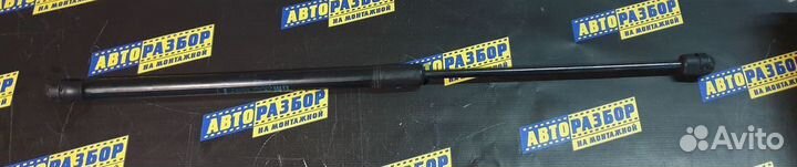 Амортизатор капота Опель Астра Н