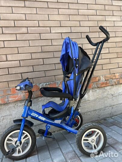 Трехколесный велосипед с ручкой