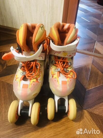 Роликовые коньки
